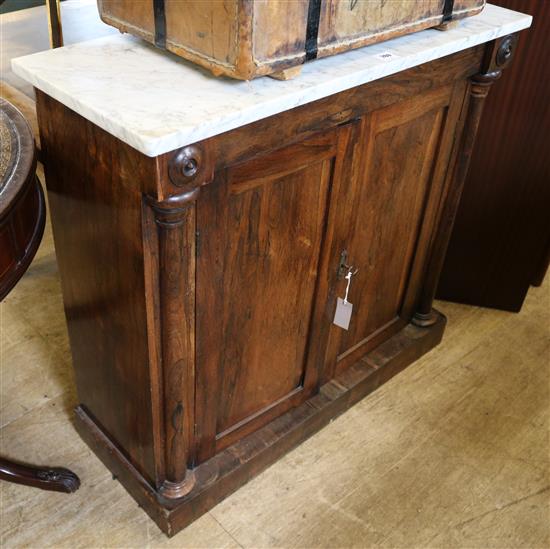 An early Victorian marble topped rosewood side cabinet, W.3ft 2in.